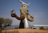 The “man-plane” statue built by Juan Ripollés at Castellón Airport by Sanbec / Wikimedia Commons