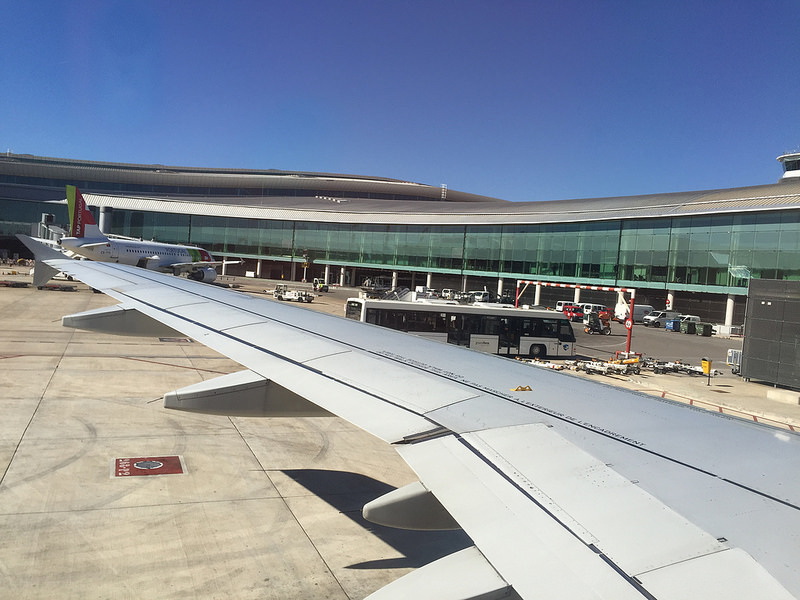 Groundforce equipment seen from an airplane at Barcelona airport by Yasunari Goto - Flickr