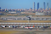 Madrid's skyscrapers from the airport and the Terminal 4 ATC tower. Flickr - Armando G Alonso.