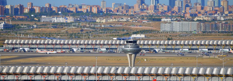 Madrid's skyscrapers from the airport and the Terminal 4 ATC tower. Flickr - Armando G Alonso.