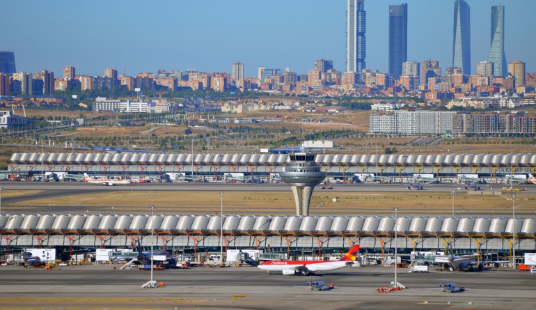 Madrid's skyscrapers from the airport and the Terminal 4 ATC tower. Flickr - Armando G Alonso.
